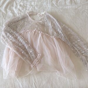 Anthropologie tulle and sequins peplum top.